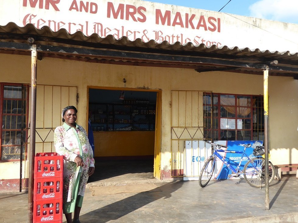 Clara Makasi is a shopkeeper in rural Zimbabwe. The goods she sells move faster since CARE has facilitated cash distribution in her community.